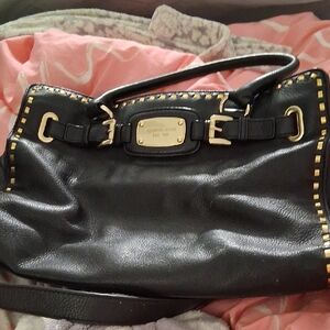 Michael Kors Black Shoulder Bag with Gold Accents. Very Good Condition. Leather.
